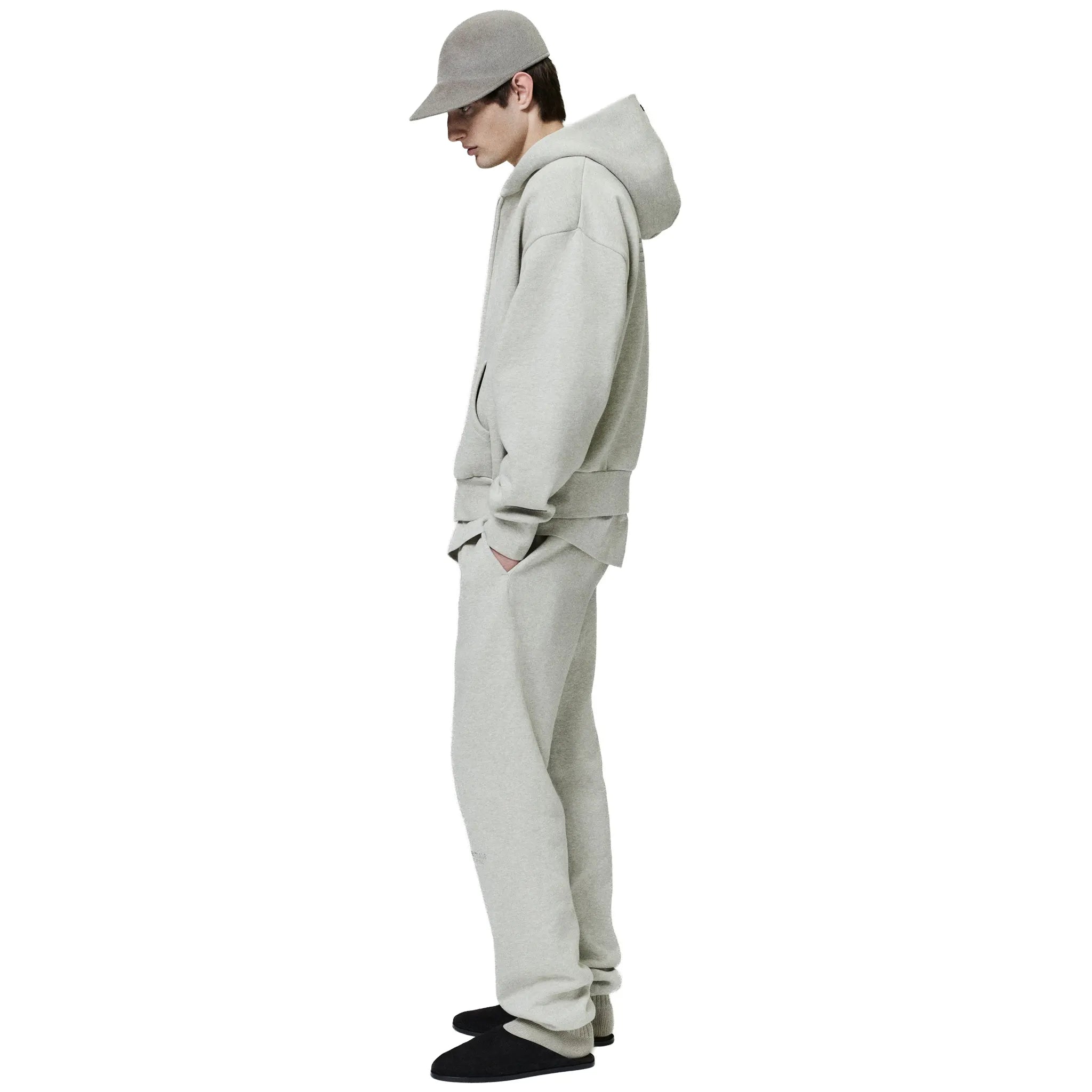 Side View of Fear Of God Essentials Classic Heather Stone Zip-Up Hoodie (SS25) 192SP254782F
